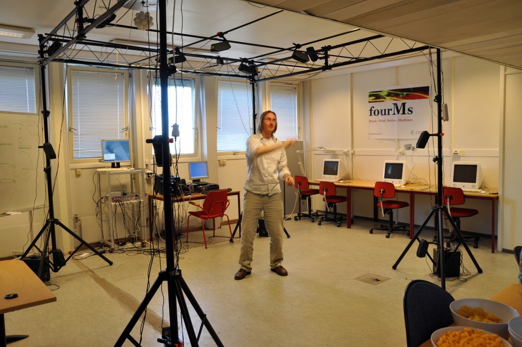 An early lab with a loudspeaker truss and a fourMs banner
